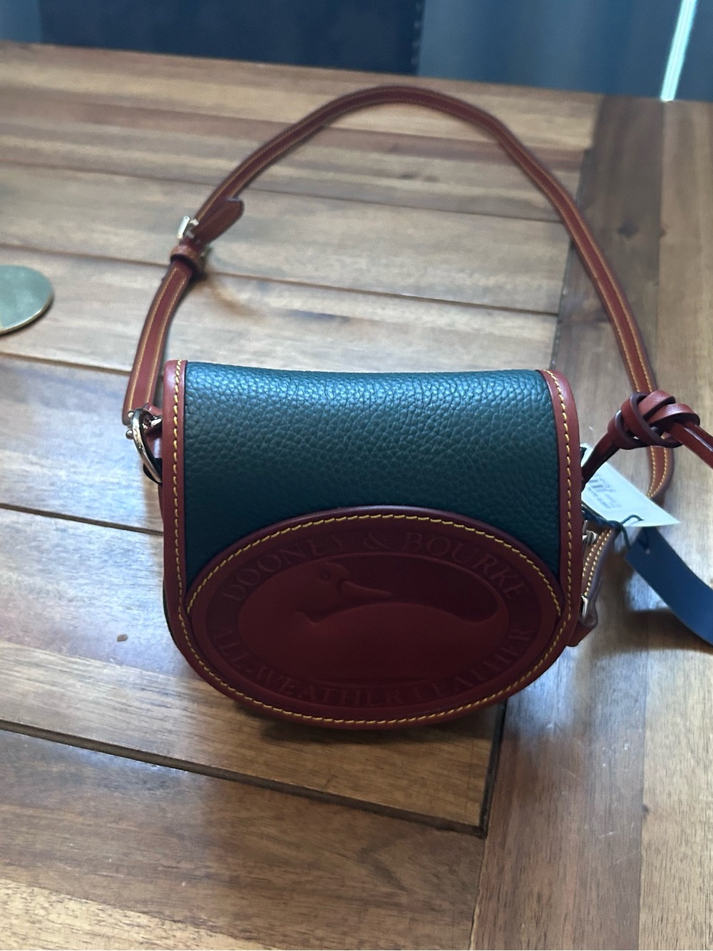 Dooney & Bourke Teal and Brown Pebble Leather Saddle Crossbody